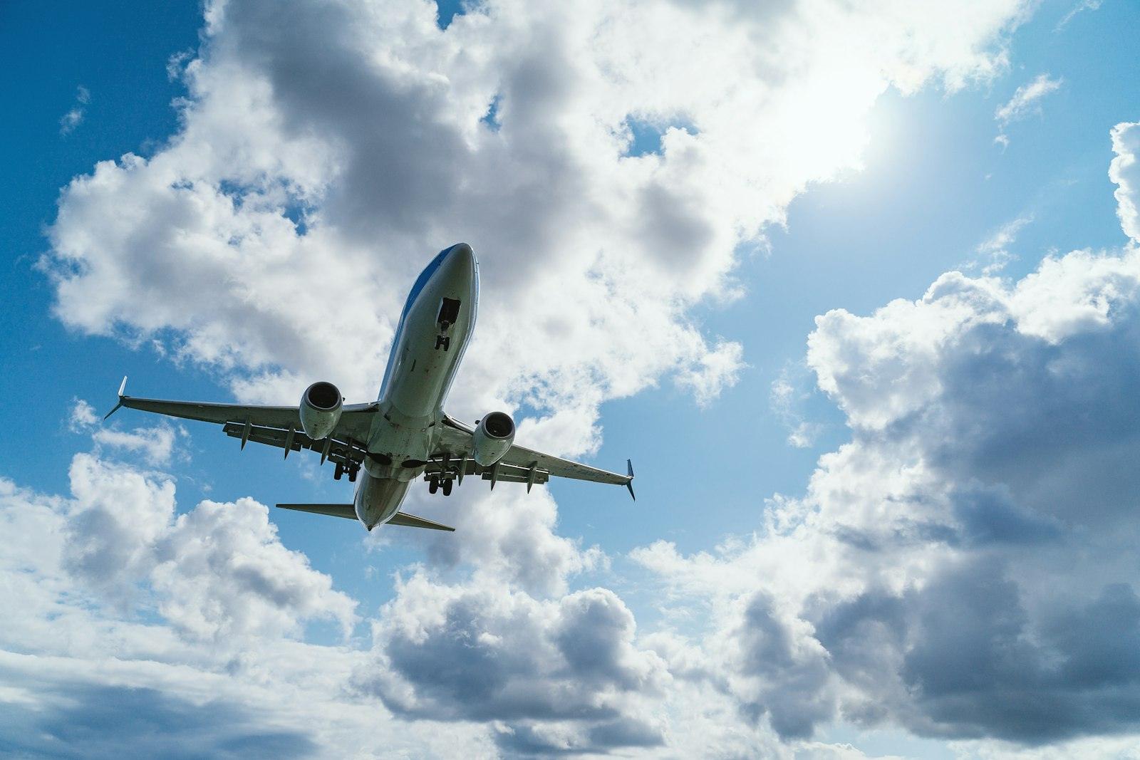 Aircraft climbing through the clouds