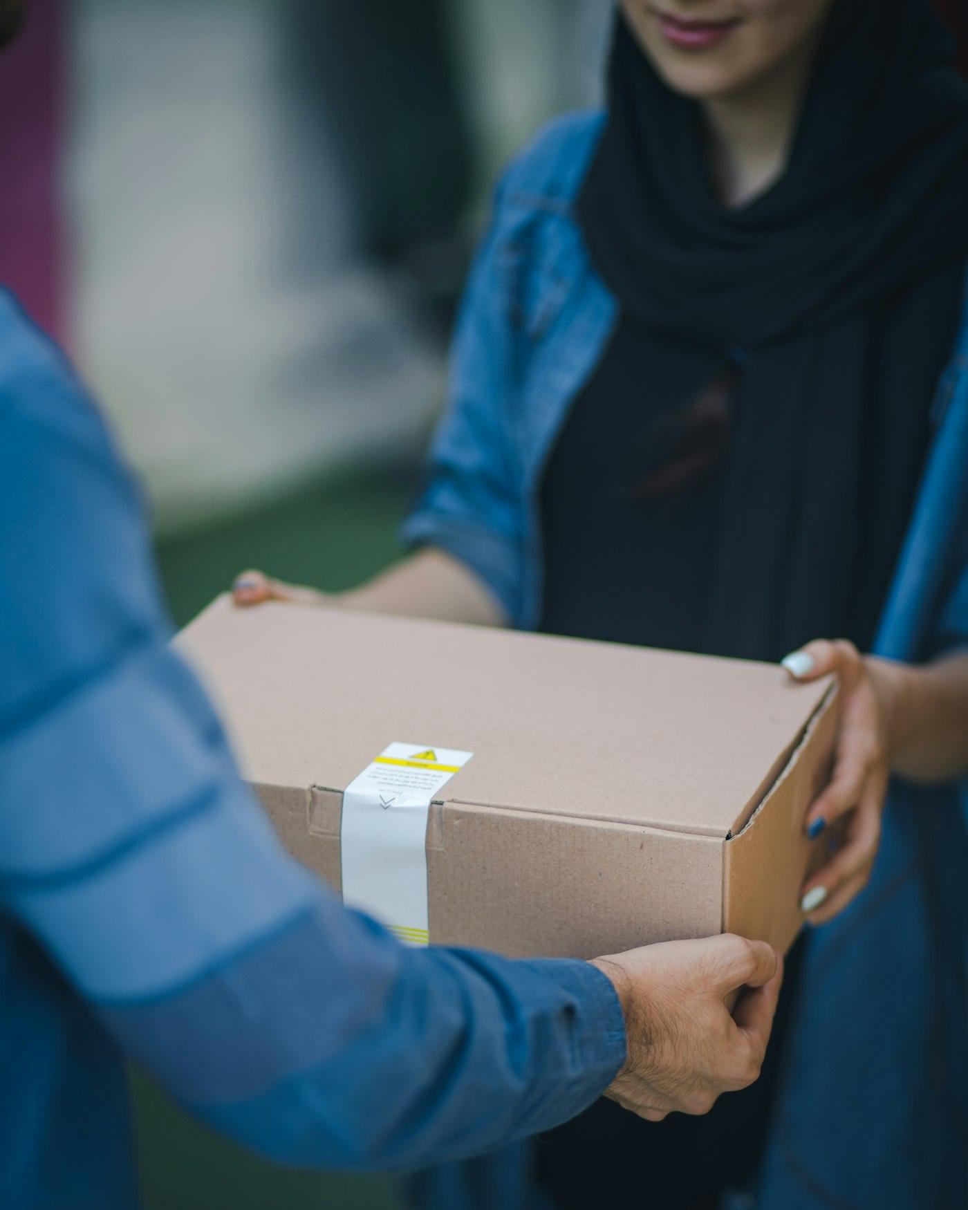 Package being handed over at delivery